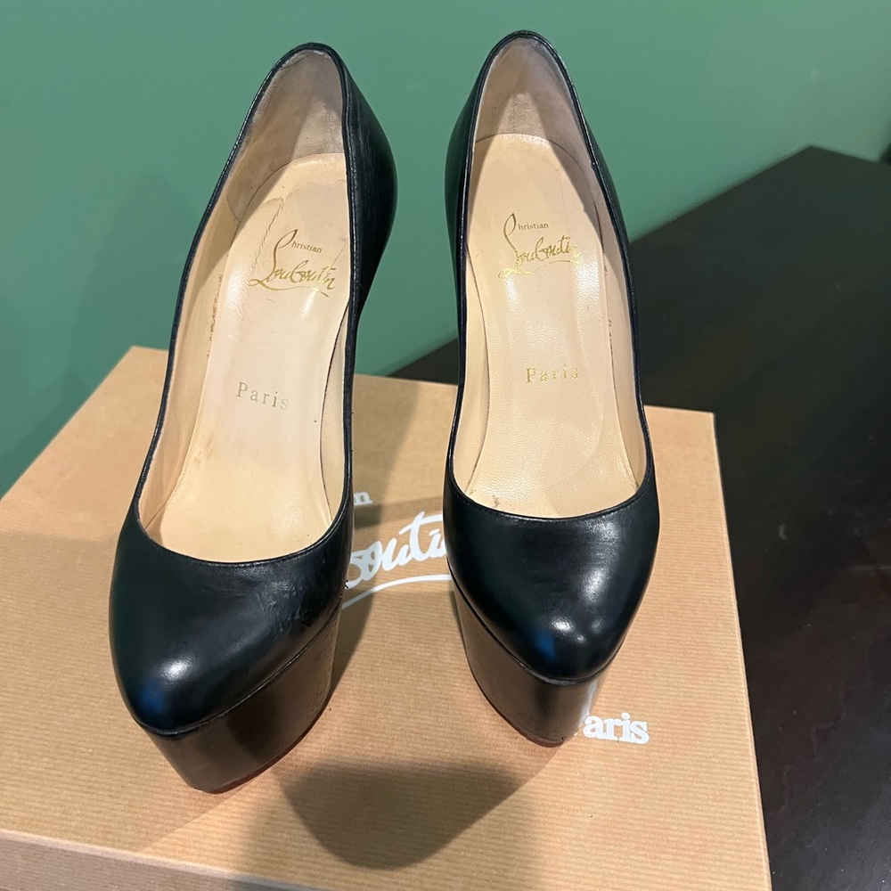 Christian Louboutin Black Heels with Pointed Toe Design and High Gloss Finish